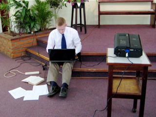 Matt working on PowerPoint at Sunday Service
