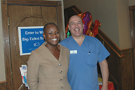 Dr. Mo then takes a break to compare hairstyles with Vera Smith Winfree, Exec Director of the Bloomfield CoC.