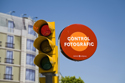 SPN751KK 005 001-Sign attached to a traffic signal warns motorists traffic controlled by camera, Barcelona, Spain 