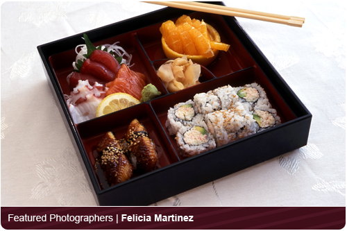 FOD351FM 107 001-California rolls, ahi tuna, sushimi, ginger, wasabi orange slices and chopsticks in bento box