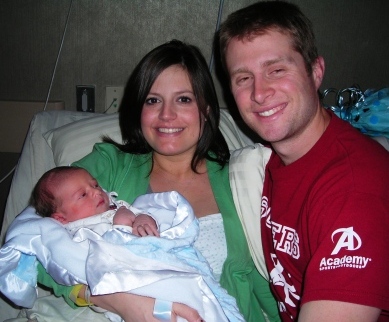 Mrs. Brandi, her husband Derek, and baby Darwin